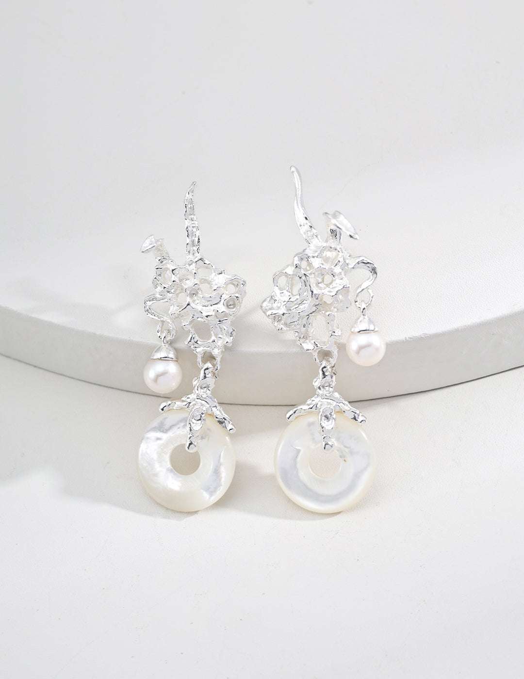 Baroque Aurora — iridescent mother‑of‑pearl shards in tarnished silver, close-up ｜Forya J'adore
